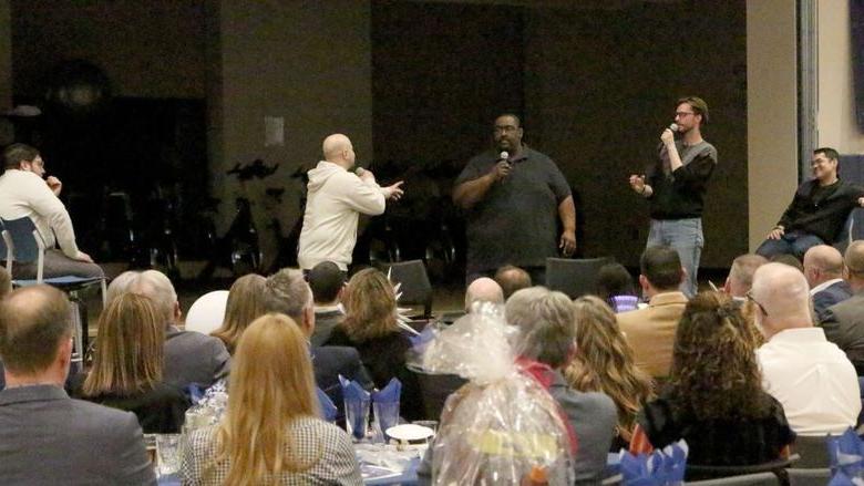 Happy Valley Improv performing on stage at the PAW Center during the Lions, Legacy and Laughter event during We Are Weekend at Penn State DuBois.