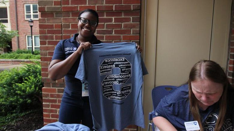 Penn State staff checks-in delegates for the Summer Leadership Conference