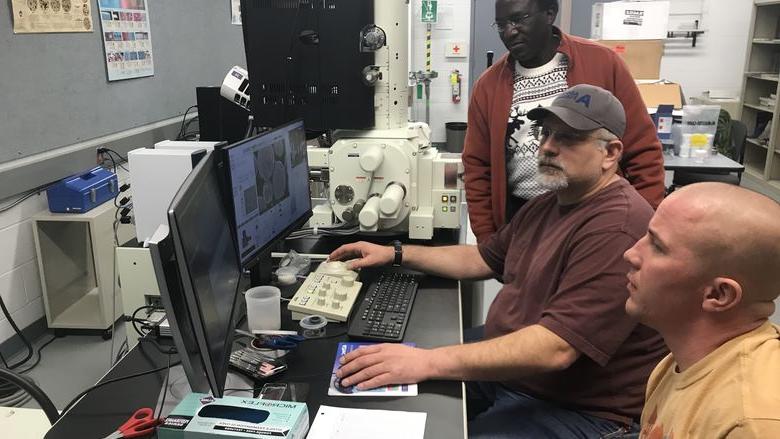 Examining the composition of powder metal samples under the new scanning electronic microscope. 