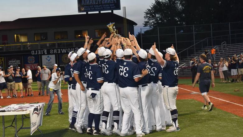 The Penn State DuBois Baseball Team hoists their championship trophy, celebrating the third USCAA World Series Victory for the team. 