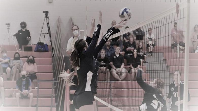 DuBois at the net in a weekend volleyball match.